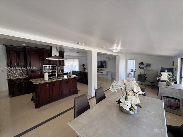 9545 SW 181st Ter, Palmetto Bay, FL 33157 - dining room with light tile patterned floors and visible vents