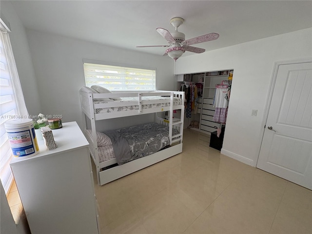 9545 SW 181st Ter, Palmetto Bay, FL 33157 - bedroom featuring a closet, baseboards, and ceiling fan
