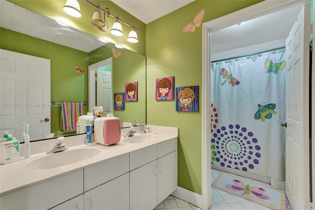 10643 NW 54th St, Doral, FL 33178 - bathroom featuring double vanity, tile patterned floors, a shower with shower curtain, and a sink