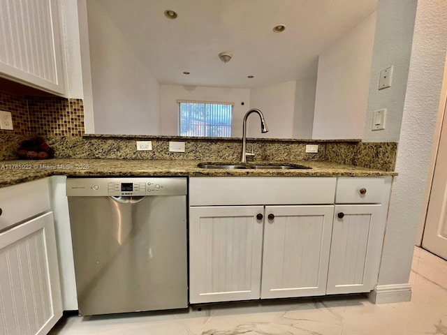 8962 SW 18th St Unit 1109, Miramar, FL 33025 - kitchen featuring a sink, stainless steel dishwasher, and dark stone counters
