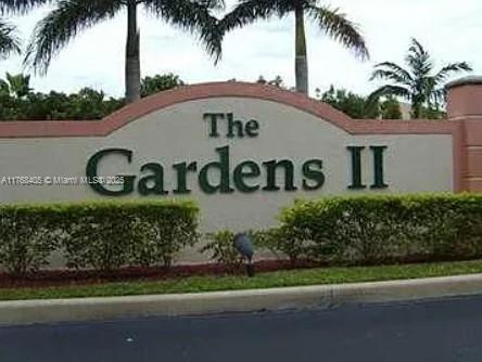 view of community sign