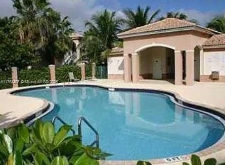 pool featuring a patio