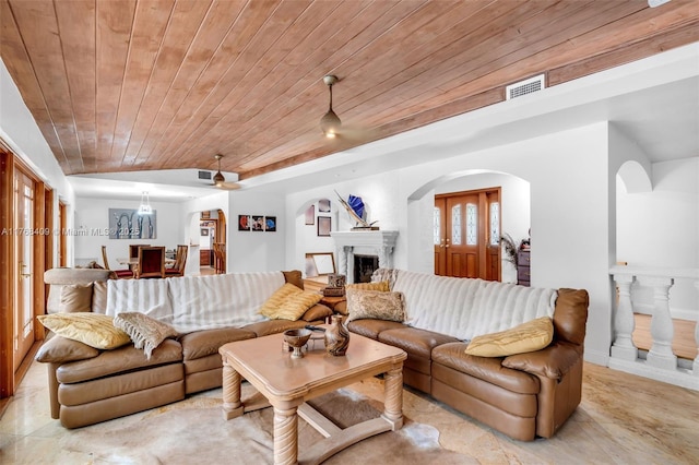 6400 Marlin Dr, Coral Gables, FL 33158 - living room featuring wooden ceiling, a fireplace, and arched walkways