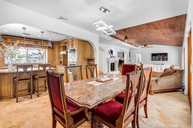 6400 Marlin Dr, Coral Gables, FL 33158 - dining area featuring arched walkways, wooden ceiling, ceiling fan, and vaulted ceiling