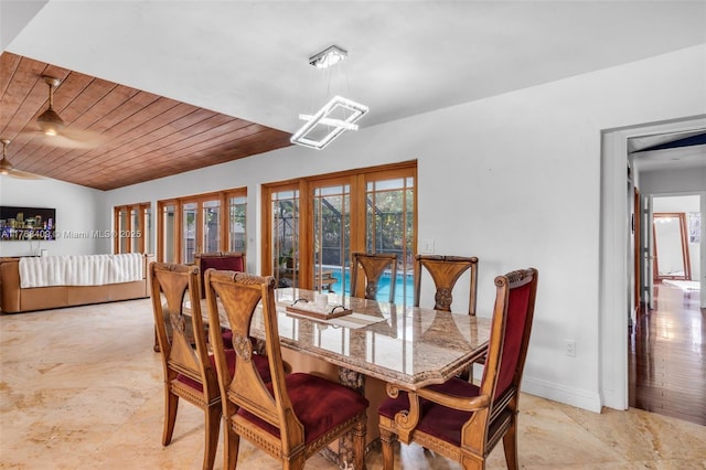 6400 Marlin Dr, Coral Gables, FL 33158 - dining space featuring french doors, wood ceiling, baseboards, ceiling fan, and a chandelier