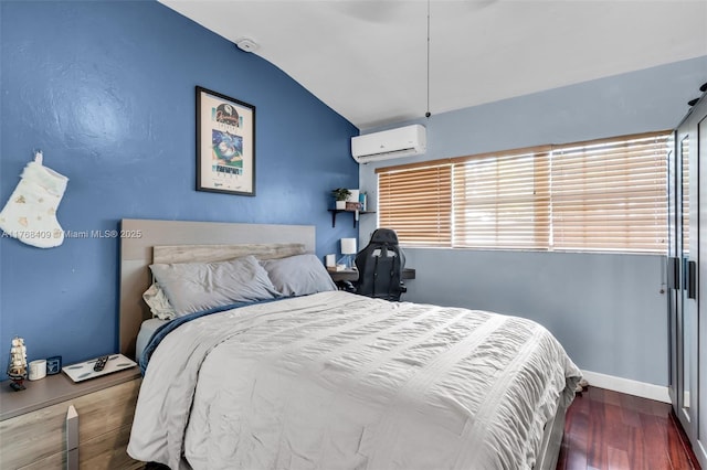 6400 Marlin Dr, Coral Gables, FL 33158 - bedroom featuring a wall unit AC, vaulted ceiling, wood finished floors, baseboards, and ceiling fan