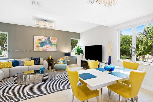 306 NE 8th Ave Unit 306, Fort Lauderdale, FL 33301 - living area with healthy amount of natural light and baseboards