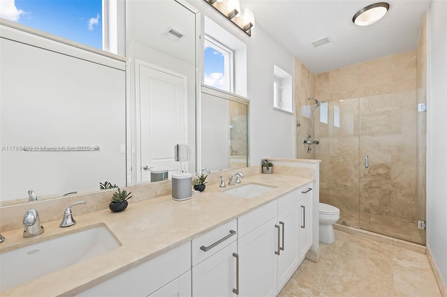 306 NE 8th Ave Unit 306, Fort Lauderdale, FL 33301 - full bathroom with a stall shower, double vanity, and toilet