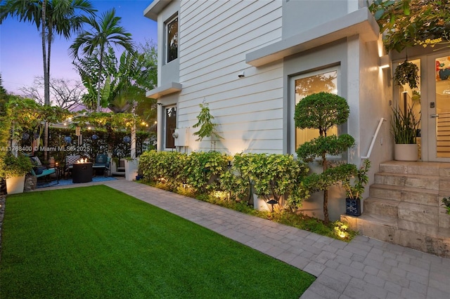 306 NE 8th Ave Unit 306, Fort Lauderdale, FL 33301 - view of grassy yard featuring a patio