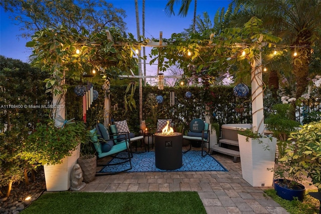 306 NE 8th Ave Unit 306, Fort Lauderdale, FL 33301 - view of patio featuring a fire pit and a hot tub