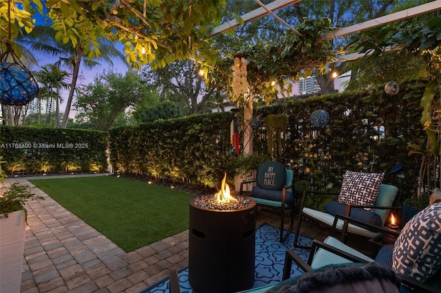 306 NE 8th Ave Unit 306, Fort Lauderdale, FL 33301 - view of patio / terrace featuring an outdoor fire pit