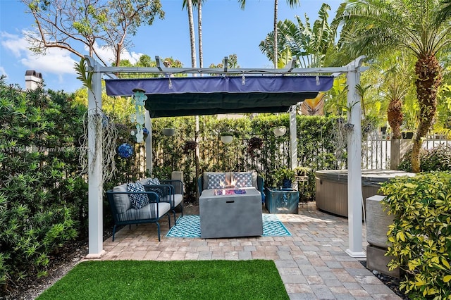 306 NE 8th Ave Unit 306, Fort Lauderdale, FL 33301 - view of patio / terrace with a hot tub and an outdoor hangout area