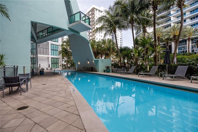 community pool featuring a patio