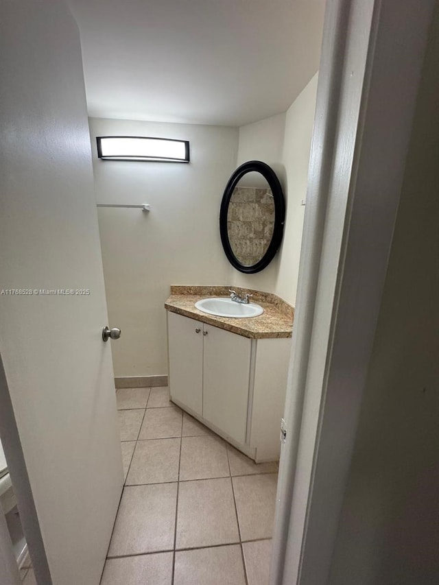 1201 NE 191st St Unit G313, Miami, FL 33179 - bathroom featuring vanity, tile patterned floors, and baseboards