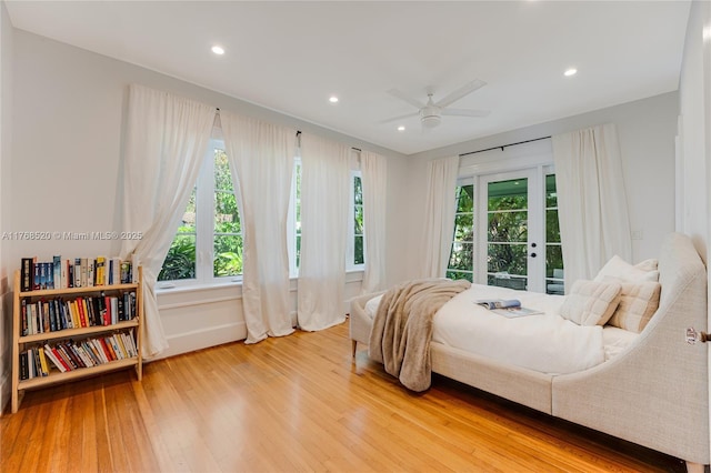 bedroom featuring recessed lighting, a ceiling fan, and wood finished floors