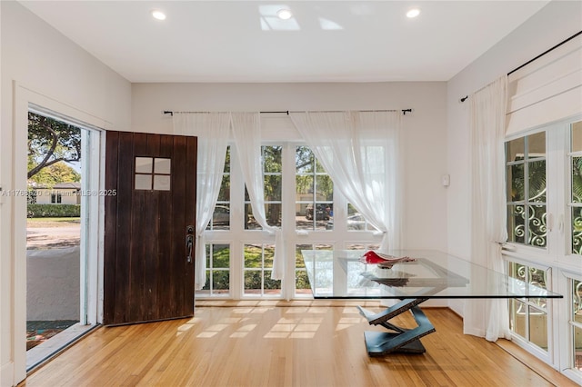 foyer with recessed lighting and wood finished floors