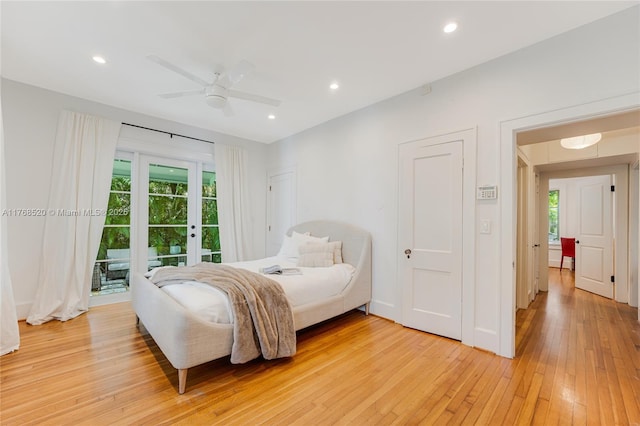 bedroom with light wood-style flooring, a ceiling fan, recessed lighting, baseboards, and access to exterior