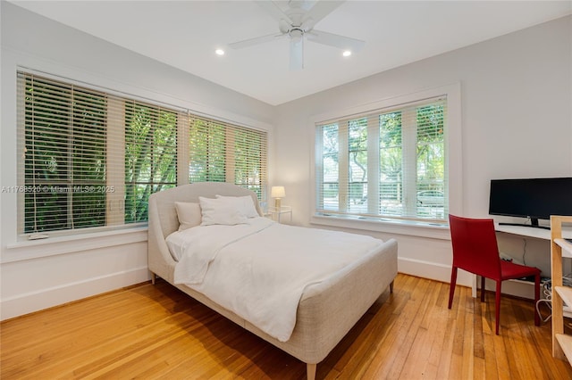 bedroom featuring recessed lighting, baseboards, light wood-style flooring, and a ceiling fan