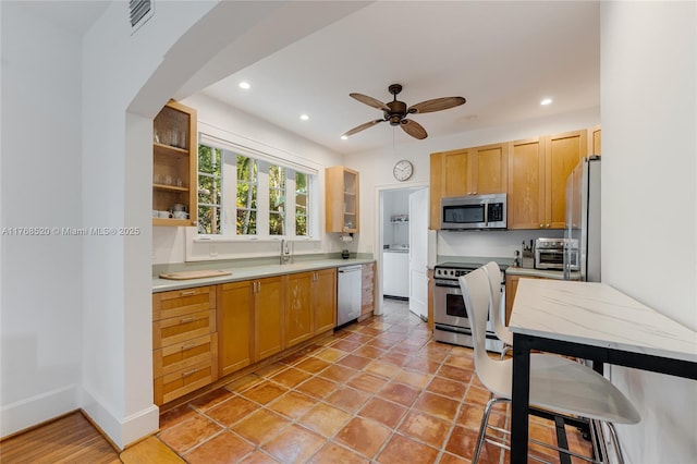 kitchen with visible vents, a ceiling fan, a sink, recessed lighting, and appliances with stainless steel finishes