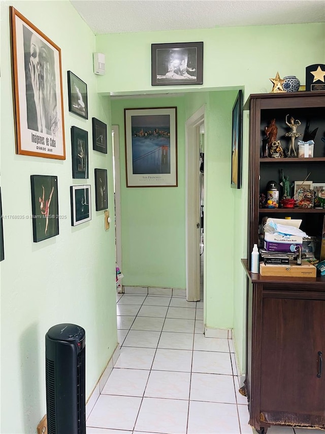 hallway with light tile patterned flooring