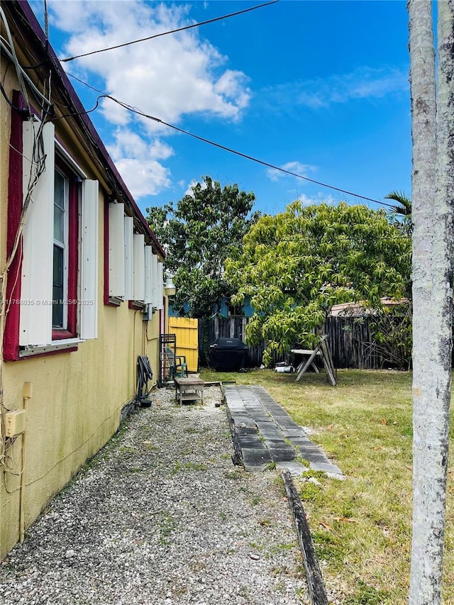 view of yard featuring fence