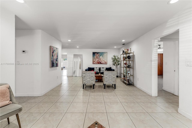 dining area with light tile patterned floors, recessed lighting, and baseboards