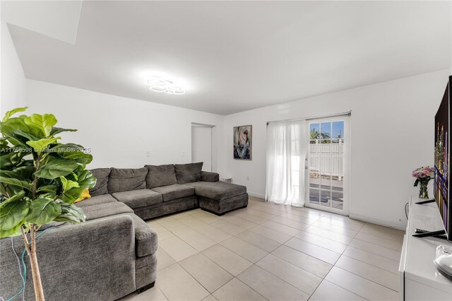 living room with light tile patterned floors