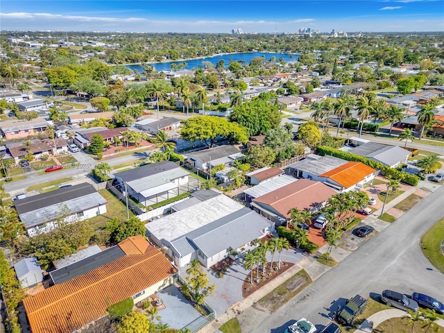aerial view featuring a residential view and a water view