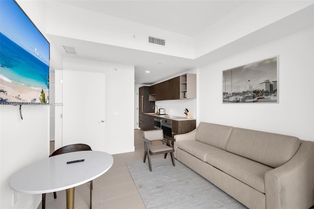 601 NE 1st Ave Unit 4814, Miami, FL 33132 - living room featuring light tile patterned floors and recessed lighting