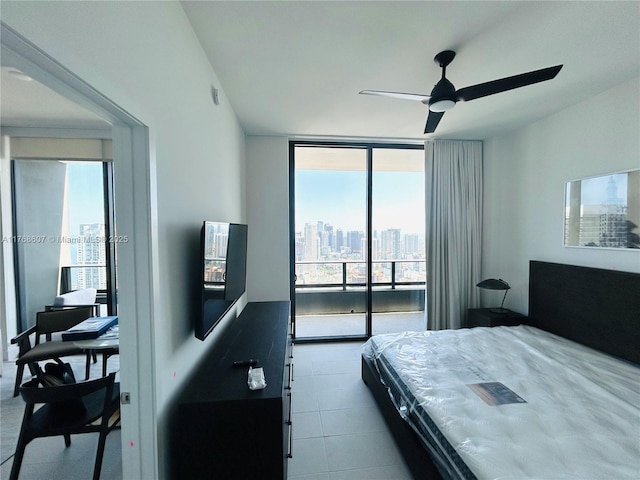 601 NE 1st Ave Unit 4814, Miami, FL 33132 - bedroom with a wall of windows, a ceiling fan, and access to outside