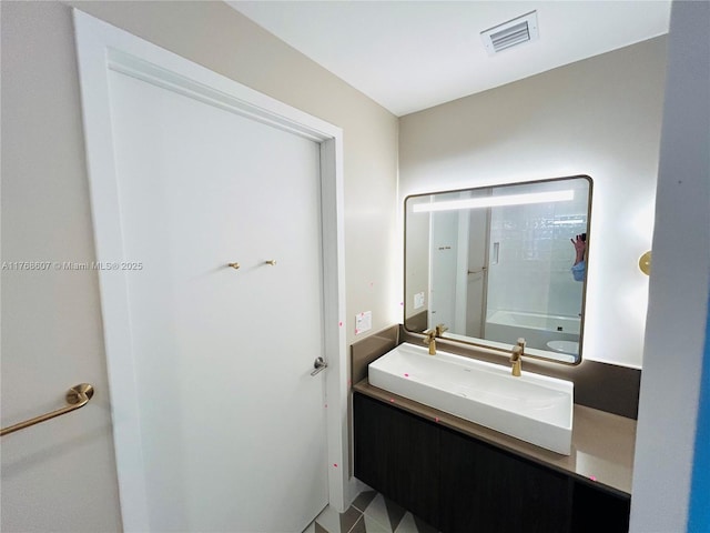 601 NE 1st Ave Unit 4814, Miami, FL 33132 - full bathroom with visible vents, vanity, and a washtub