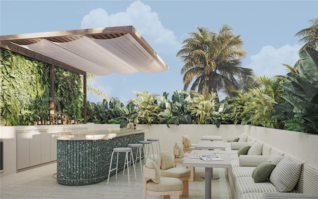 view of patio / terrace with a wooden deck and outdoor dry bar