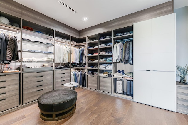 4780 SW 86th Ter, Miami, FL 33143 - walk in closet featuring visible vents and wood finished floors