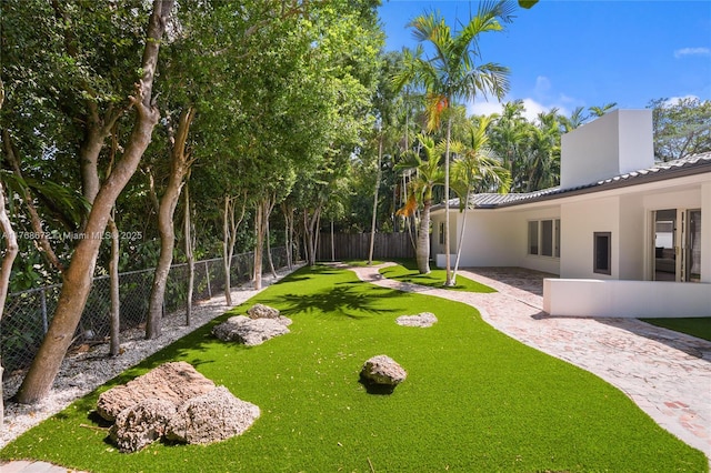 1221 NE 87th St, Miami, FL 33138 - view of yard with a patio area and fence