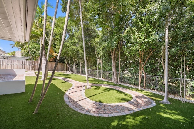 1221 NE 87th St, Miami, FL 33138 - view of community with a lawn and a fenced backyard