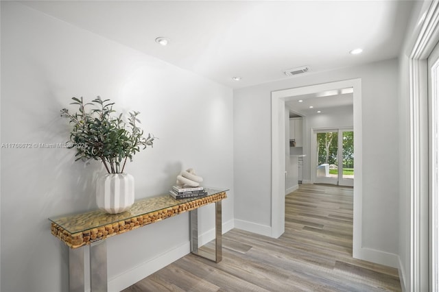1221 NE 87th St, Miami, FL 33138 - hall with french doors, recessed lighting, baseboards, wood finished floors, and visible vents
