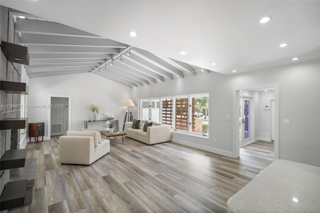 1221 NE 87th St, Miami, FL 33138 - living area with recessed lighting, lofted ceiling with beams, baseboards, and wood finished floors
