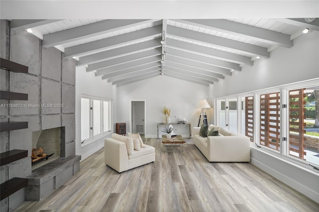 1221 NE 87th St, Miami, FL 33138 - living area with a large fireplace, beamed ceiling, high vaulted ceiling, and wood finished floors