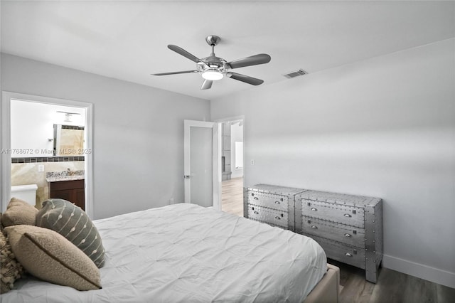 1221 NE 87th St, Miami, FL 33138 - bedroom with a ceiling fan, baseboards, wood finished floors, ensuite bathroom, and visible vents