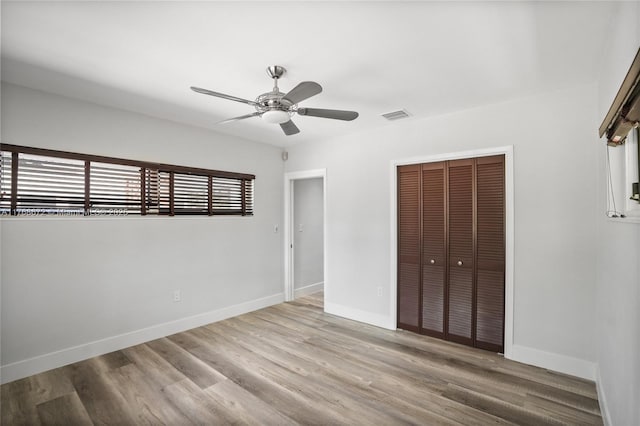1221 NE 87th St, Miami, FL 33138 - unfurnished bedroom featuring visible vents, baseboards, wood finished floors, and a closet