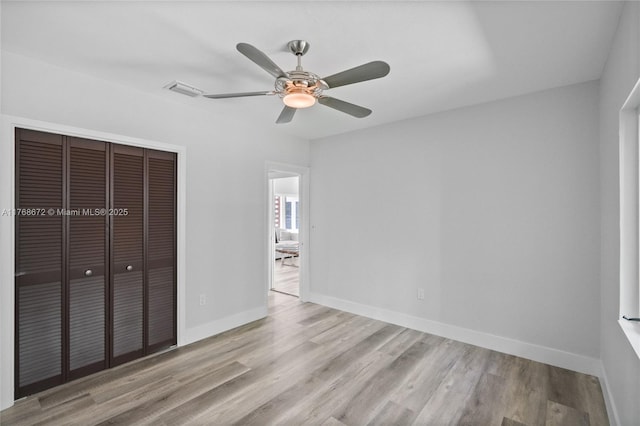 1221 NE 87th St, Miami, FL 33138 - unfurnished bedroom featuring baseboards, a ceiling fan, a closet, and wood finished floors