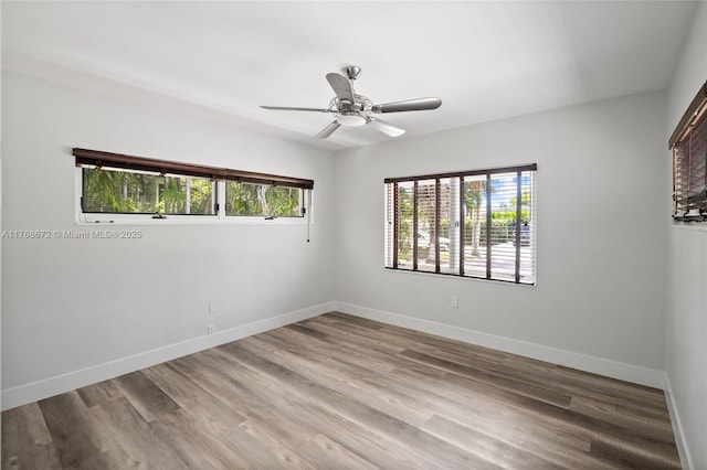 1221 NE 87th St, Miami, FL 33138 - empty room featuring baseboards, a ceiling fan, and wood finished floors