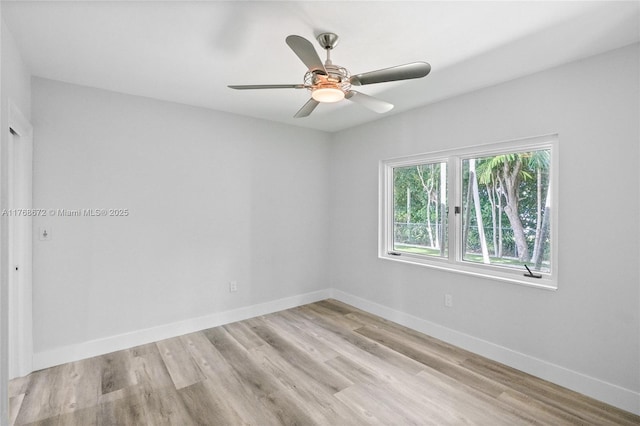 1221 NE 87th St, Miami, FL 33138 - spare room with baseboards, a ceiling fan, and light wood-style flooring
