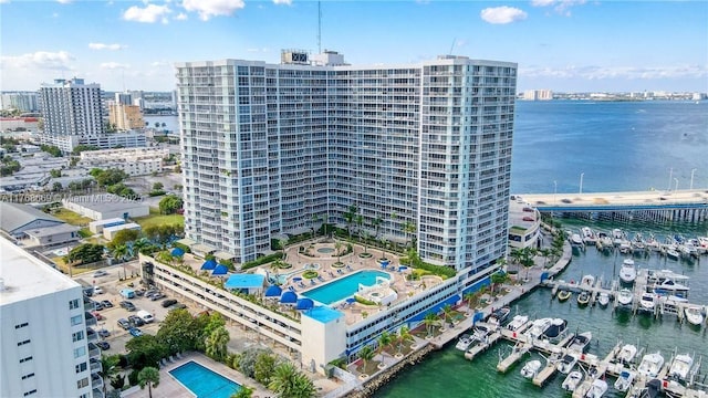 drone / aerial view with a water view and a view of city