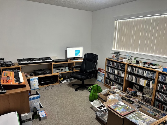 carpeted home office with a textured ceiling