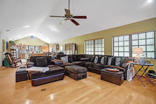 living area with hardwood / wood-style floors, plenty of natural light, and ceiling fan