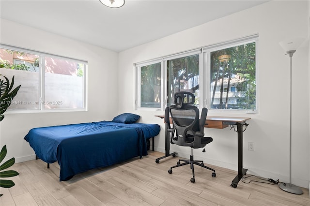 740 Meridian Ave Unit 11, Miami Beach, FL 33139 - bedroom with wood finished floors and baseboards
