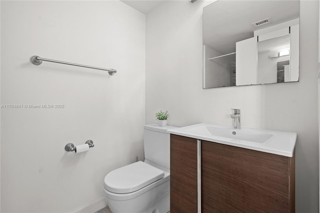 740 Meridian Ave Unit 11, Miami Beach, FL 33139 - bathroom featuring toilet and vanity