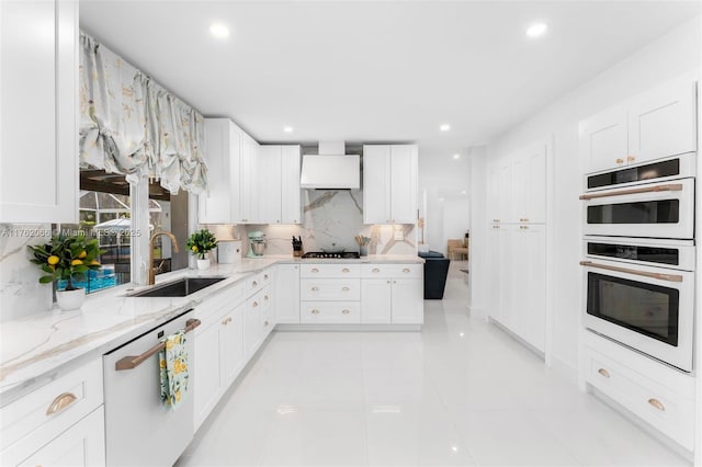 13453 SW 58th Ave, Pinecrest, FL 33156 - kitchen with white appliances, decorative backsplash, light stone countertops, white cabinetry, and recessed lighting