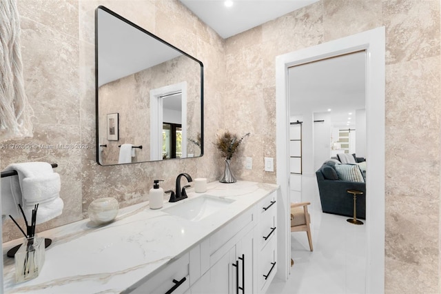 13453 SW 58th Ave, Pinecrest, FL 33156 - bathroom featuring vanity and tile walls